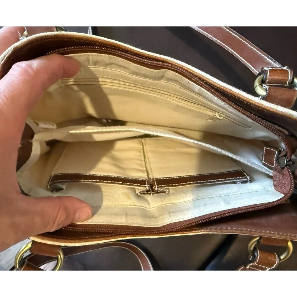 Rosetti shoulder bag with matching wallet in a white and brown color scheme.